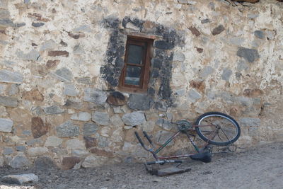 Bicycle on brick wall