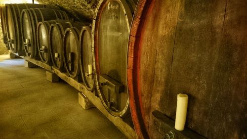 Row of wine bottles in container