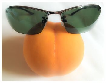 Close-up of sunglasses on table