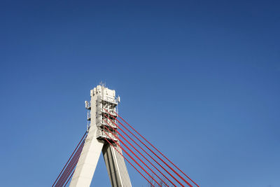 Low angle view of built structure against clear blue sky