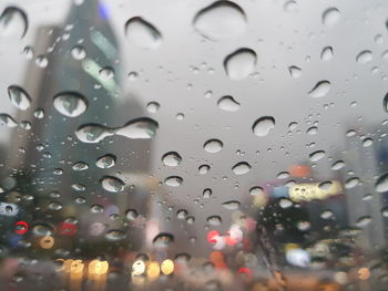 Full frame shot of raindrops on glass window