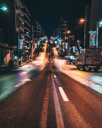 Light trails on city street at night