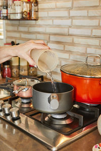 Midsection of woman preparing food on table