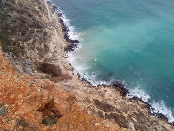 High angle view of rocky beach