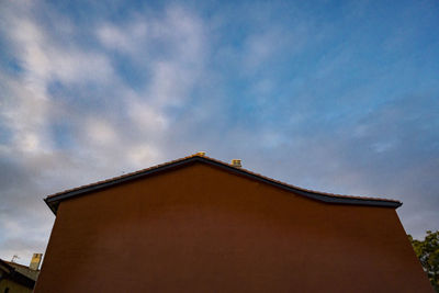 Low angle view of house against sky