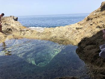 Scenic view of sea against clear sky