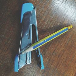 High angle view of clothespins on table