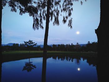 Scenic view of lake against blue sky