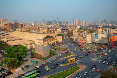 High angle view of city street and buildings against sky