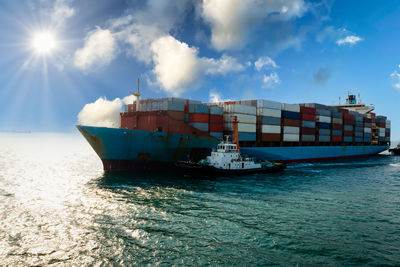 Ship in sea against sky