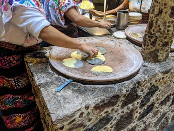 High angle view of woman preparing food