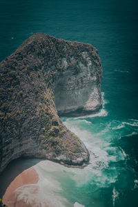 High angle view of rock formation in sea