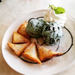 Close-up of ice cream in plate on table