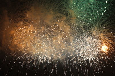 Firework display at night