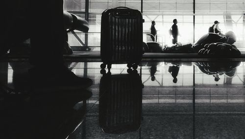 Luggage on floor at airport departure area