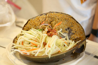 Close-up of noodles in bowl on table