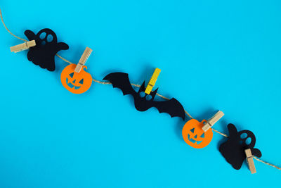 High angle view of stuffed toy against blue background