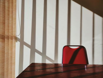 Close-up of chair on table at home