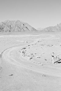 Scenic view of desert against clear sky