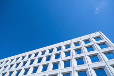 Abstract image of a modern architecture background. office building and sky