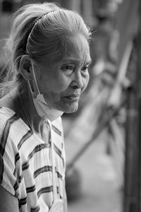 Portrait of smiling young woman outdoors