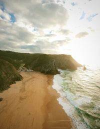 Scenic view of beach against sky