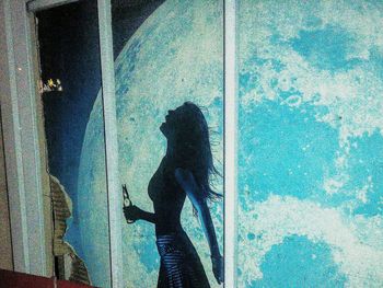 Shadow of woman on wall