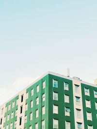 Low angle view of modern building against clear sky