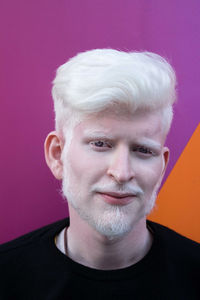 Portrait of an albino man looking in the camera