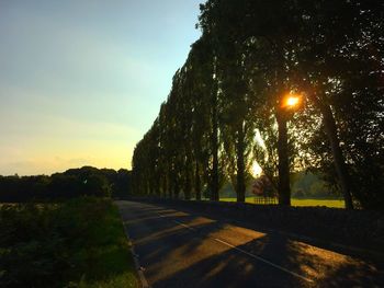 Empty road at sunset