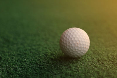 Close-up of ball on grassland