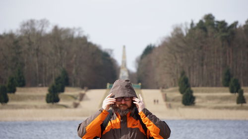 Man wearing sunglasses against sky