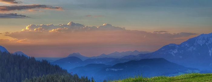 Scenic view of mountains against sky during sunset