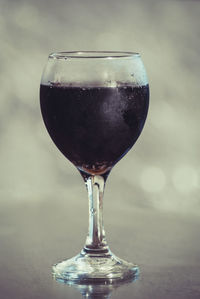 Close-up of wine glass on table