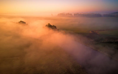 High angle view of landscape against sky during sunset