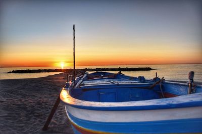 Scenic view of sea against clear sky during sunset