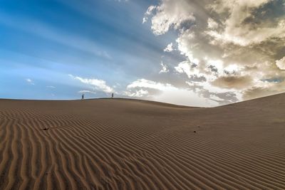 Scenic view of desert against sky