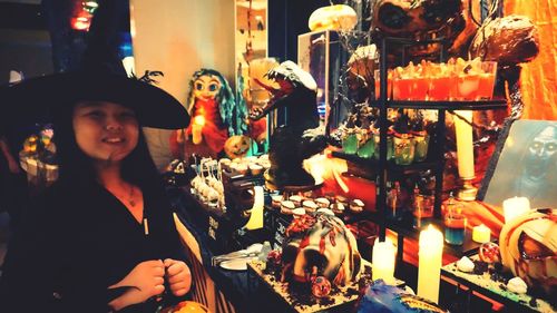 Woman in store for sale at market stall