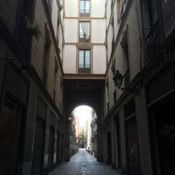 Narrow alley along buildings