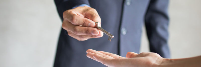 Close-up of man holding hands