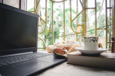 Coffee cup on table