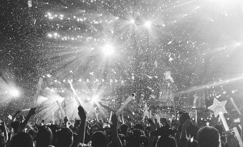 Crowd enjoying at music concert