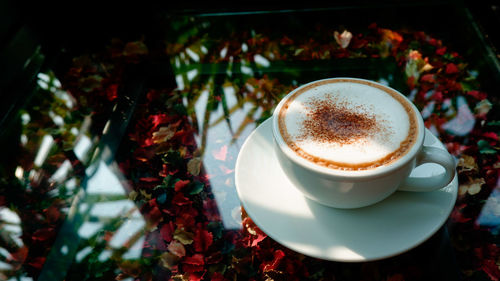 Close-up of coffee cup on table