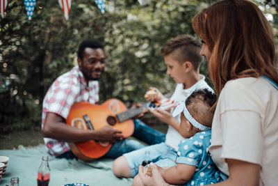 Group of people playing guitar