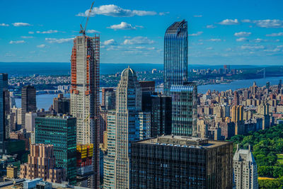 Modern buildings in city against sky