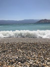 Scenic view of sea against clear sky