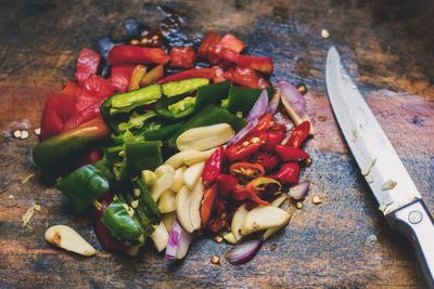 High angle view of chopped vegetables on cutting board