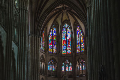 Low angle view of glass window in building