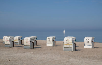 Panoramic view of beach against clear blue sky