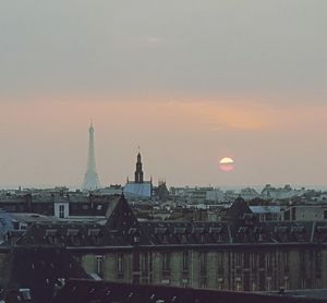 View of cityscape against sky at dusk